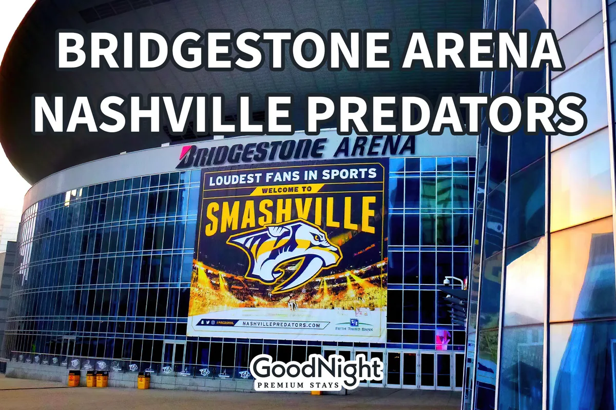 The well-known Bridgestone Arena entrance, featuring the iconic sign, Nashville Predators logo, and energetic banners. The exterior is alive with anticipation, echoing the excitement of live music and sports events.